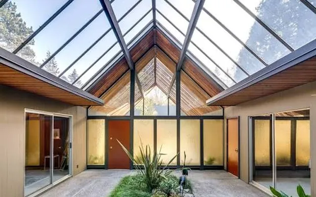 The glazed double-gable atrium of a Rummer home.